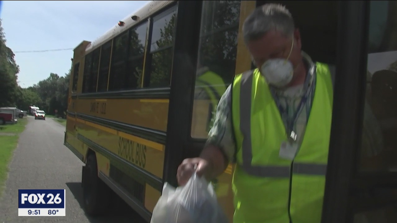 SANTA FE SCHOOL BUS DRIVERS DELIVER MEALS