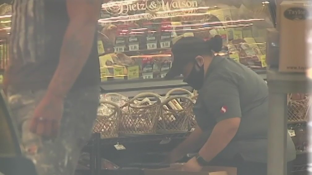 Essential workers react to lifting of COVID restrictions in Texas