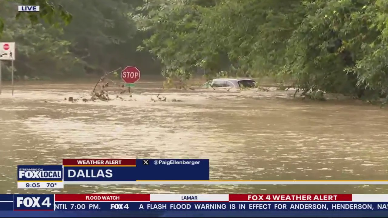 Vehicle stuck in high water near White Rock Lake