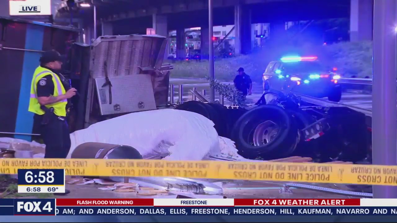 18-wheeler hangs from Dallas bridge after crash