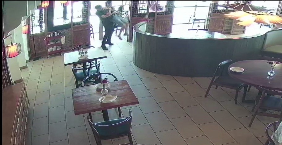 VIDEO: Fast acting employee saves woman's life after she was seen choking