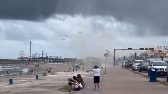 Scary video of waterspout blowing people over in Galveston