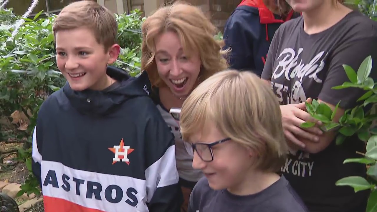Young boy surprised with World Series tickets