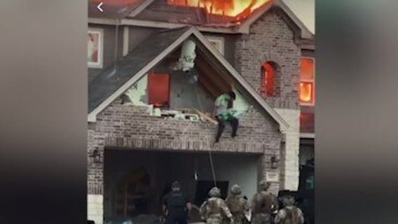 VIDEO: Pablo Patino seen climbing out of house while it's on fire after standoff in Spring