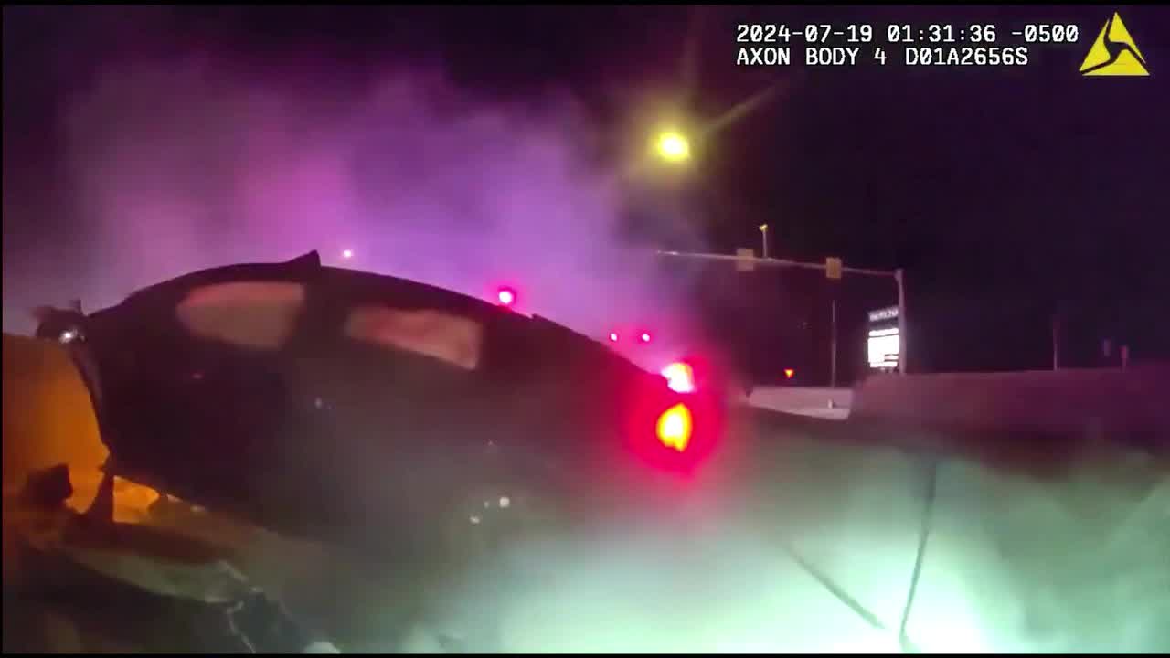 VIDEO: The Colony PD rescues driver from burning car