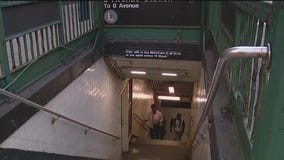 Off-duty officer pushed onto subway tracks: sources