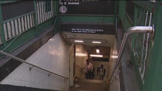 Off-duty officer pushed onto subway tracks: sources