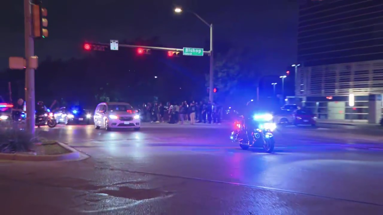 RAW: Fallen Dallas officer's body taken to ME's office