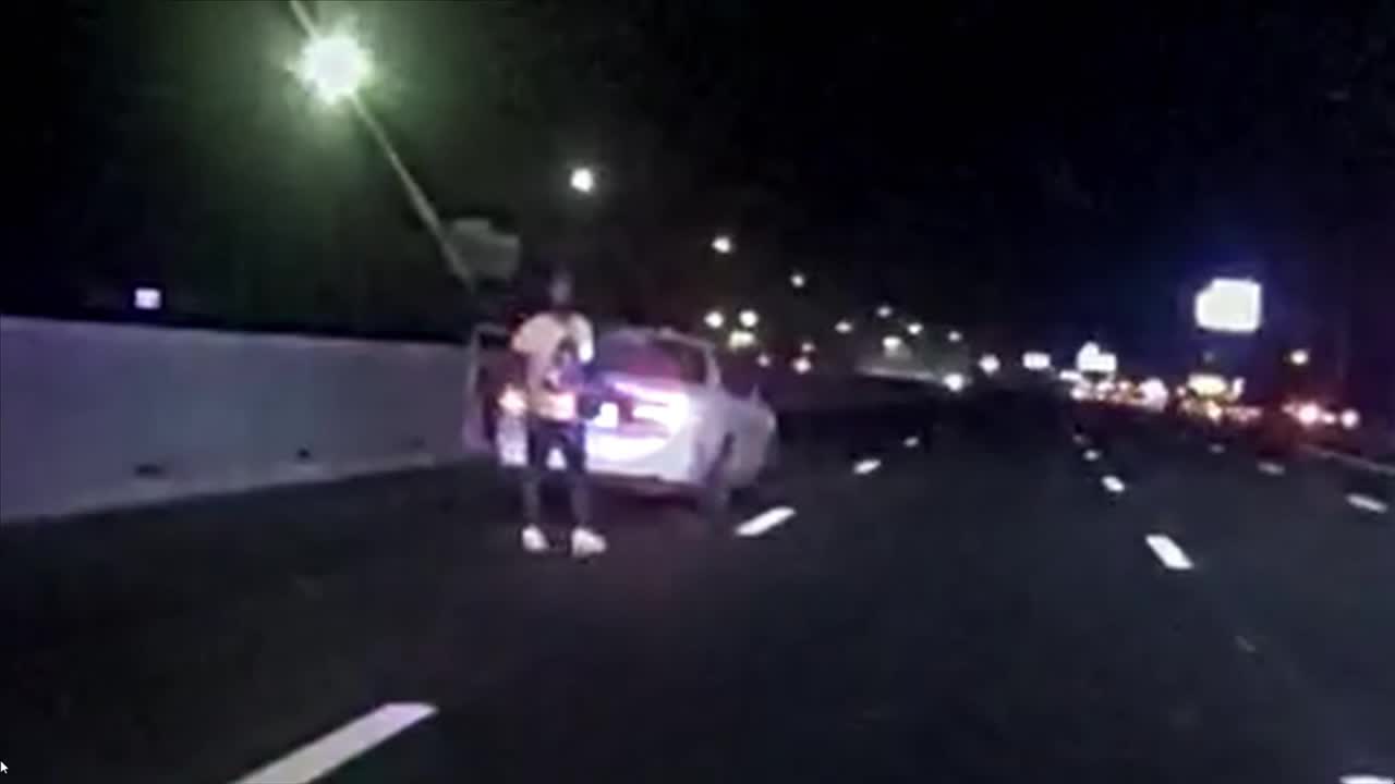 RAW: Dashcam video of Dallas officer shooting supsect