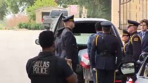 Officer Darron Burks arrives at funeral home