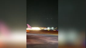 FedEx plane crash lands at airport, sparks