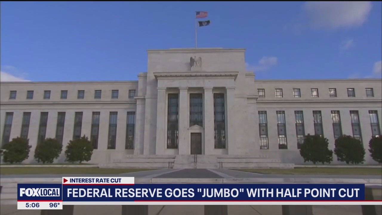 Federal Reserve cuts interest rates by half-point