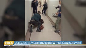 ICE Agent caught on camera shoving woman to ground in violent encounter, investigation underway