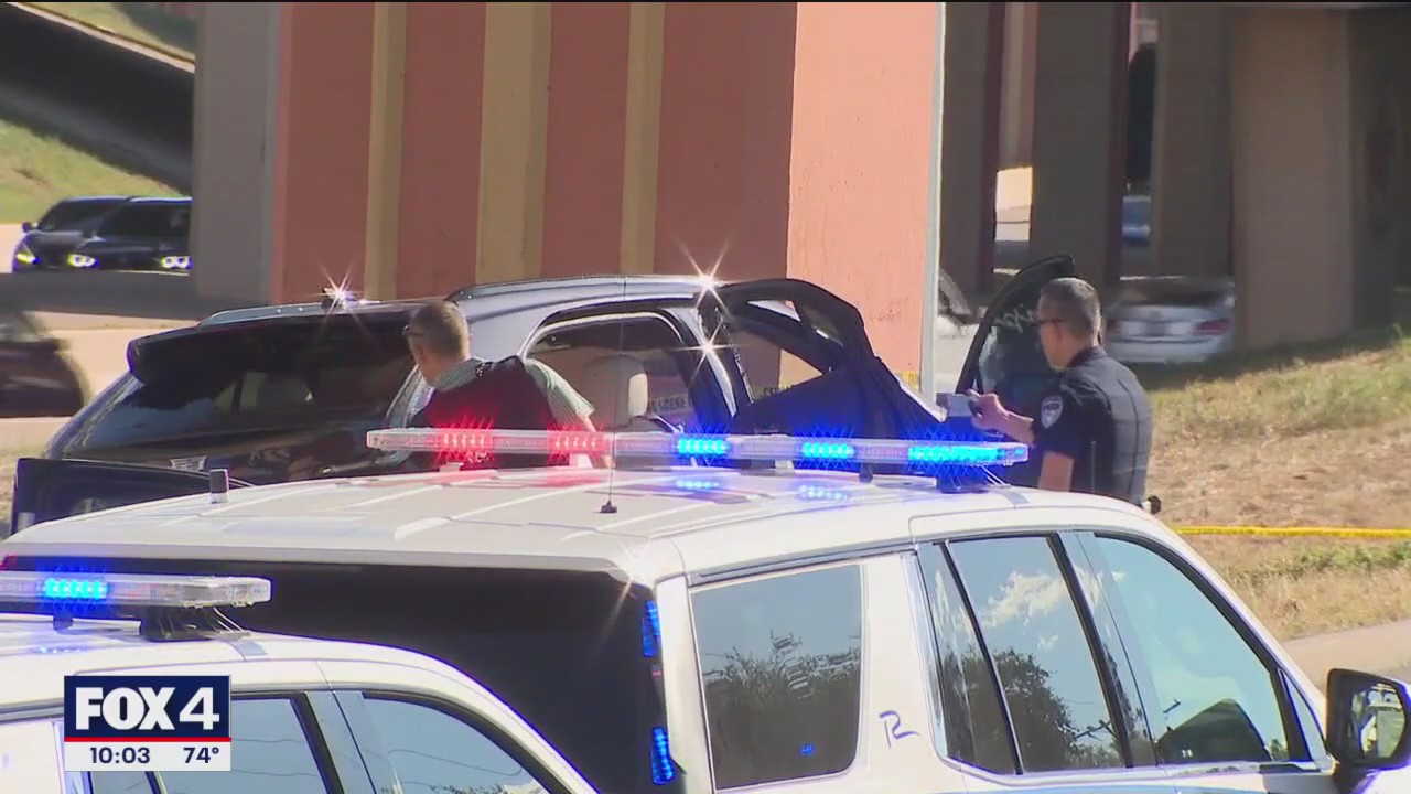 Woman shot by murder suspect during chase dies