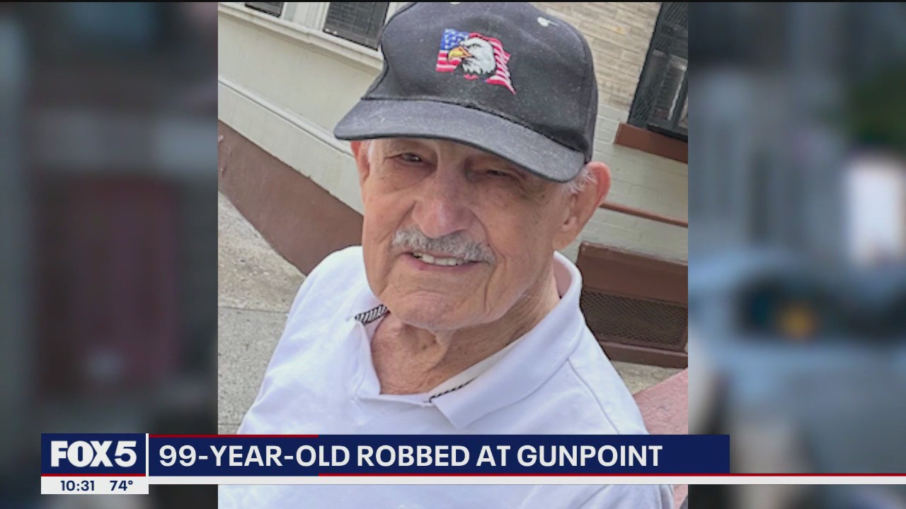 99-year-old robbed at gunpoint