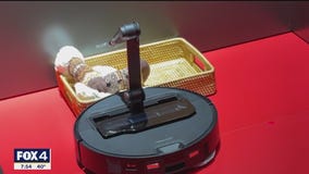 Robotic vacuum with arm that can pick up your laundry?