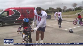 Texans host heartwarming holiday bike giveaway