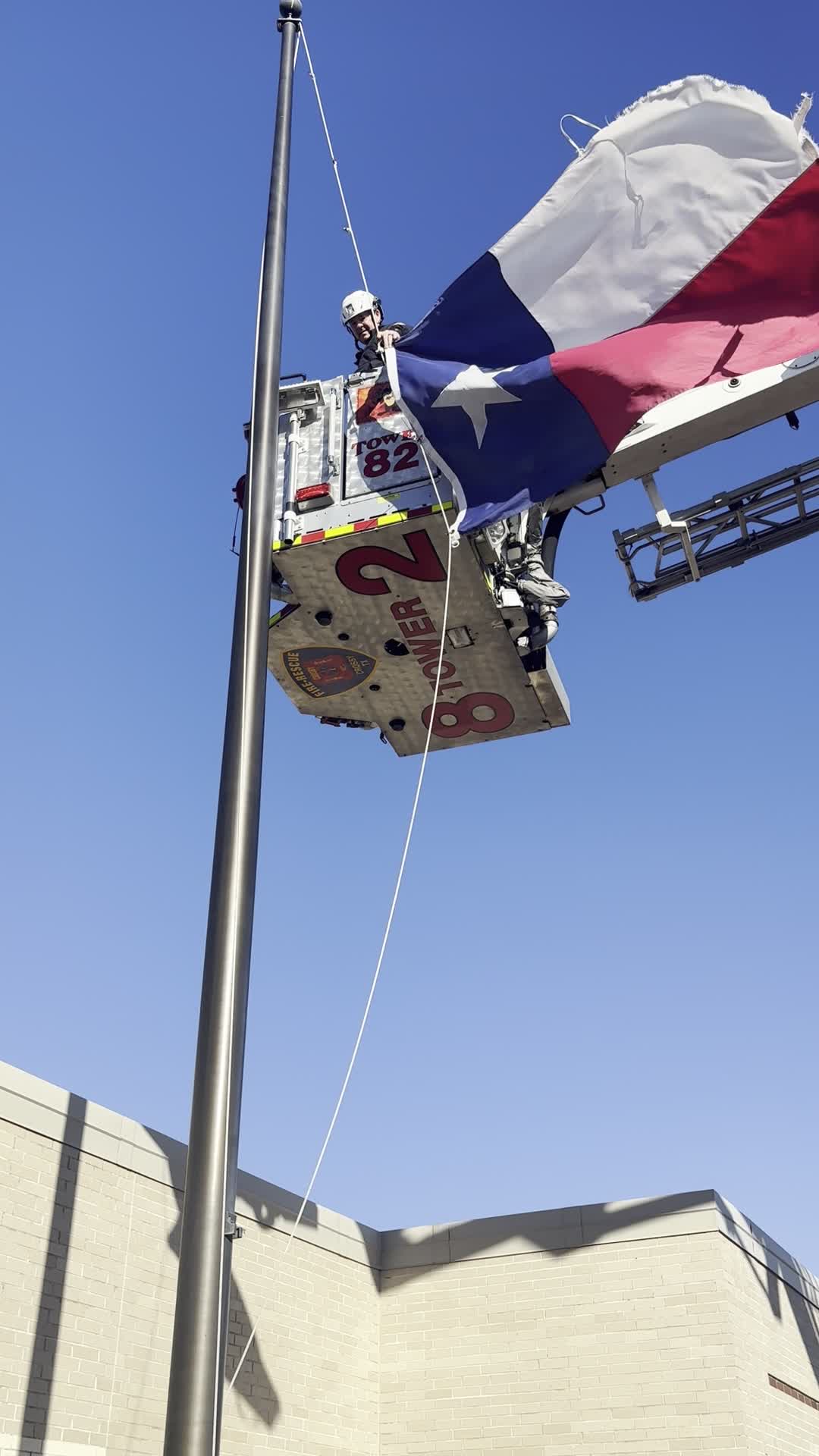 Crosby volunteer firefighters help replacing flags