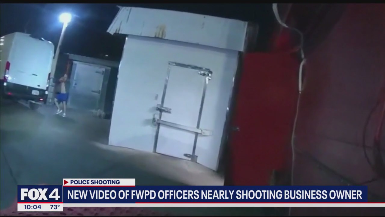 Video shows police nearly shooting businessowner
