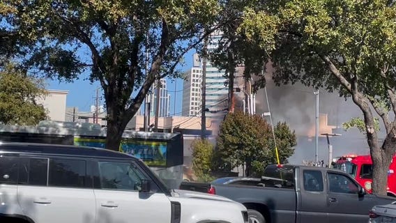 Car on fire on Westheimer Road near the Galleria