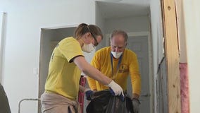 Volunteers clean up flooded homes in Conroe