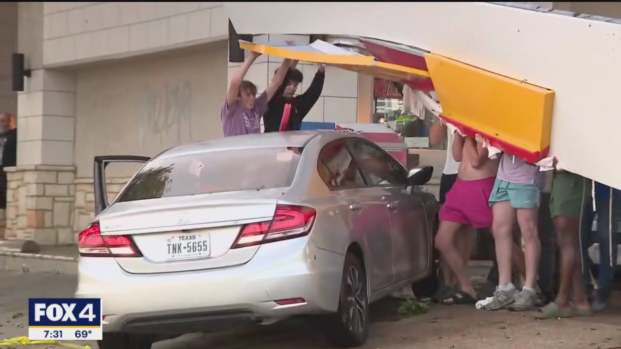 High school students lift collapsed roof after storms