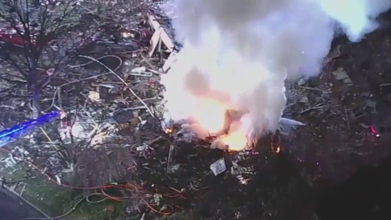 Virginia home explosion kills firefighter