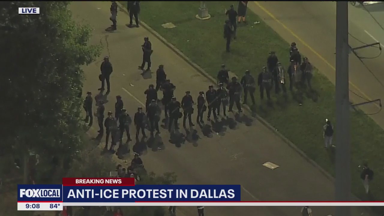 Dallas Anti-Ice protest marching through Trinity Groves