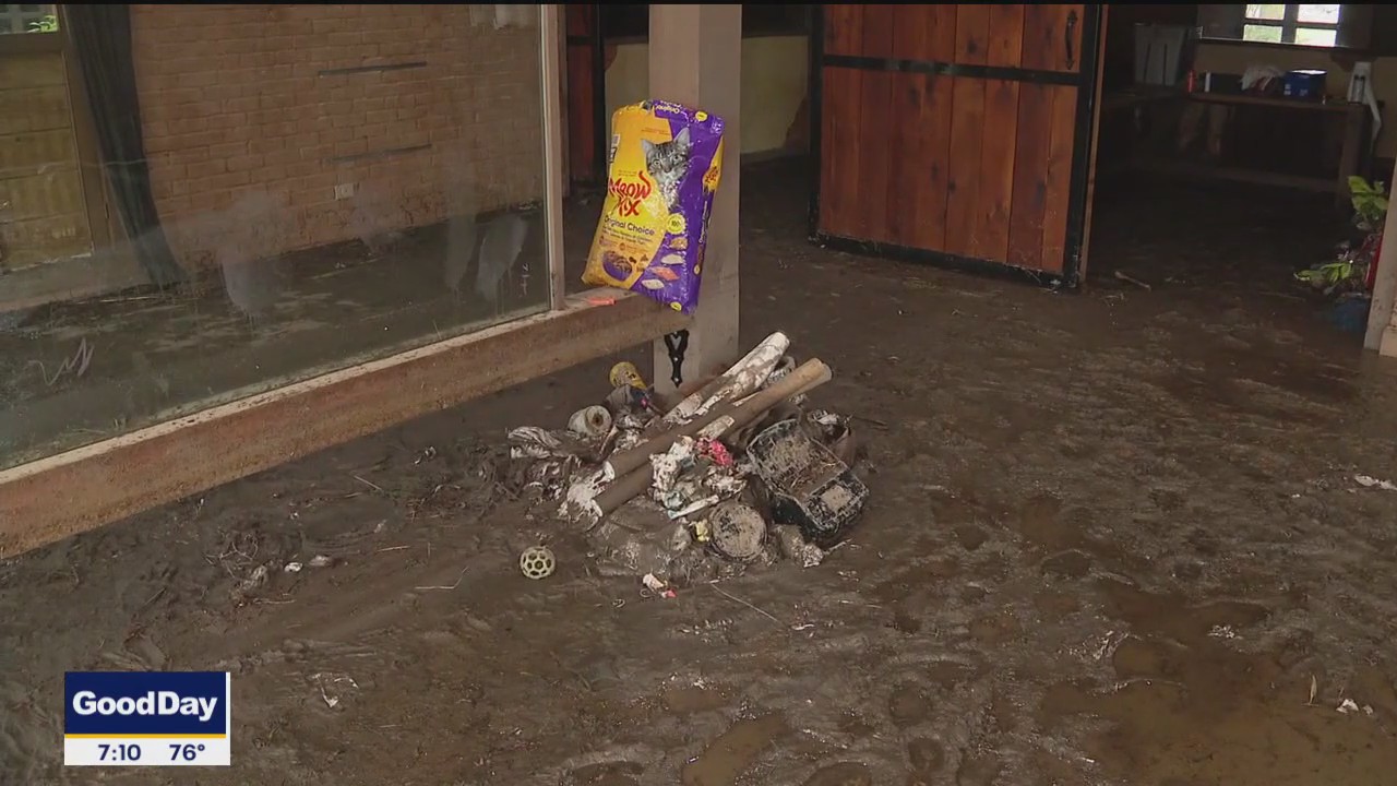 Families recall memories before homes destroyed by floods