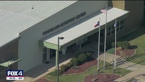 11 charged in ambush on ICE officer at detention center
