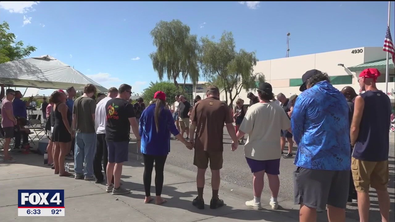 Prayer circle at Turning Point USA for Charlie Kirk