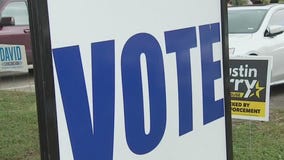 Voters cast last minute ballots inside NRG Arena