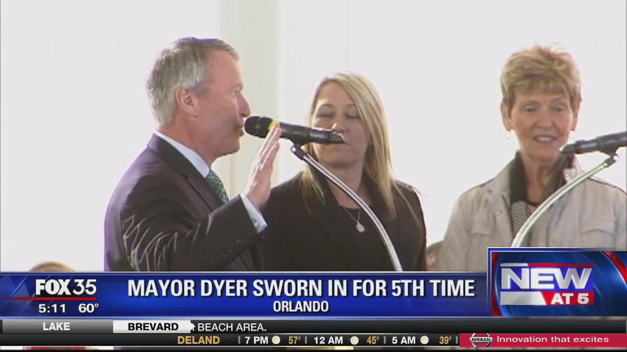 Buddy Dyer and commissioners swearing in