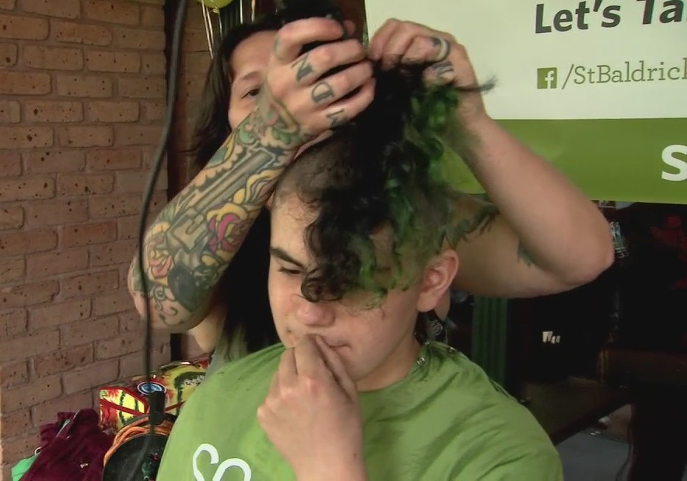 Shaving heads to help raise money for cancer research