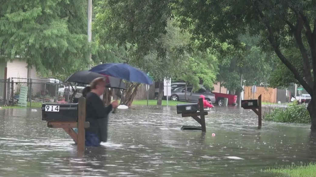 Galveston County residents describe heavy flooding in their community.