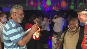 Gallery Furniture celebrating with neighbors living with autism