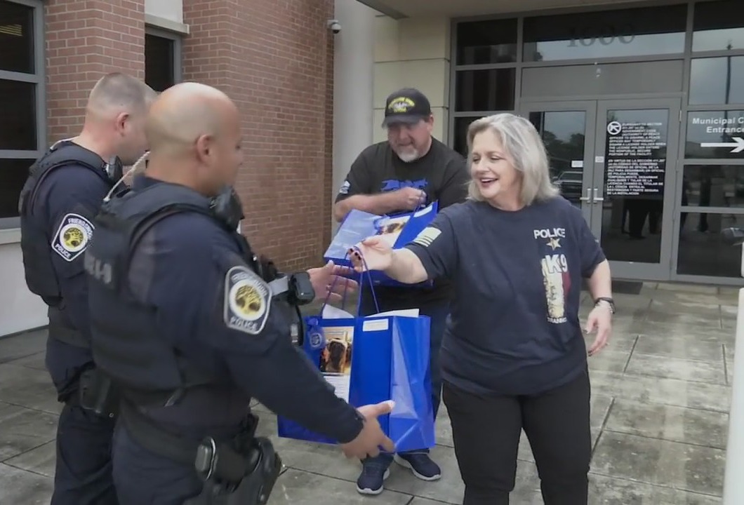 Friendswood couple spreads holiday cheer to K9 police officers