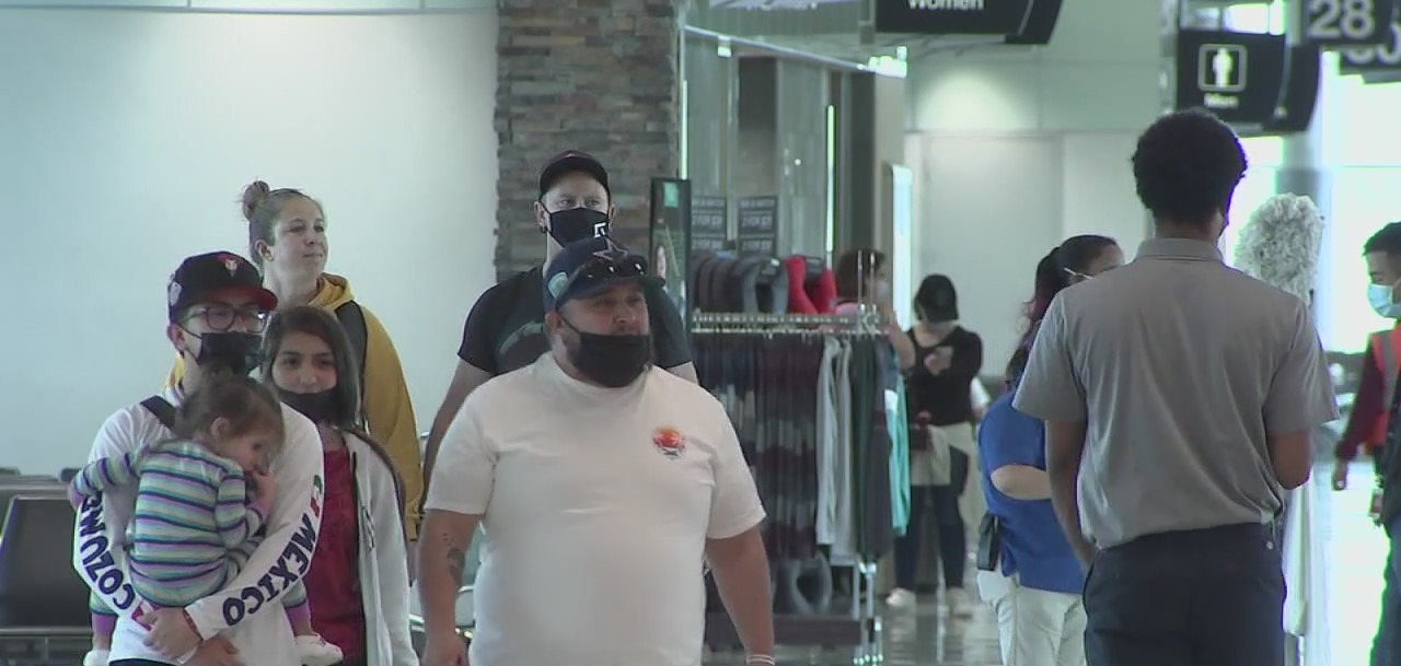 Omicron has many airlines warning of staff shortages, travelers rethinking plans