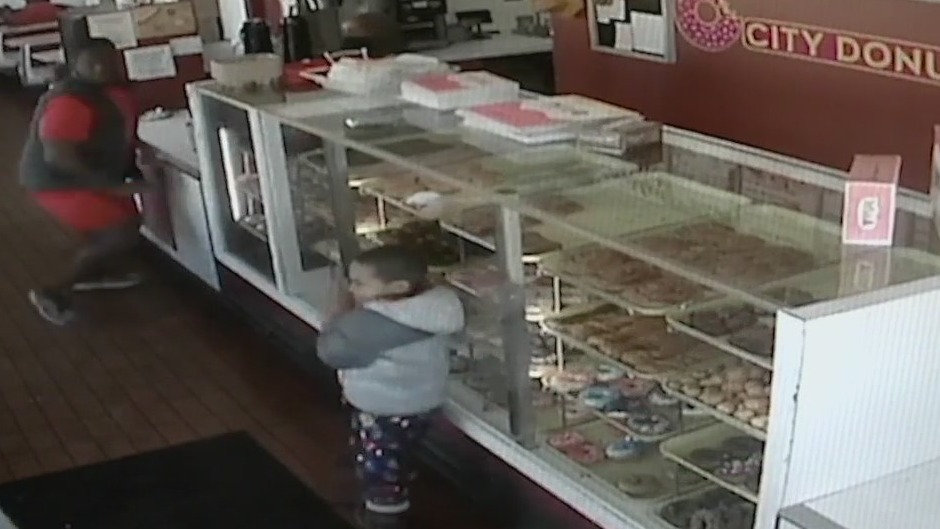 Caught on Camera: Dad saves son from car crashing into donut shop