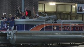 Fans watching Houston Astros victory parade from 'Space City' boat
