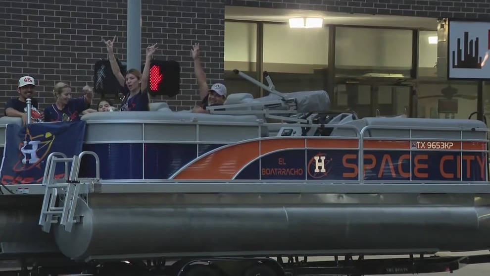 Fans watching Houston Astros victory parade from 'Space City' boat