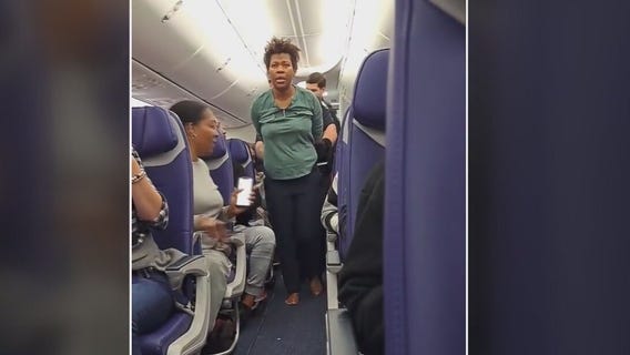 Woman escorted off Southwest flight for "unruly behavior"