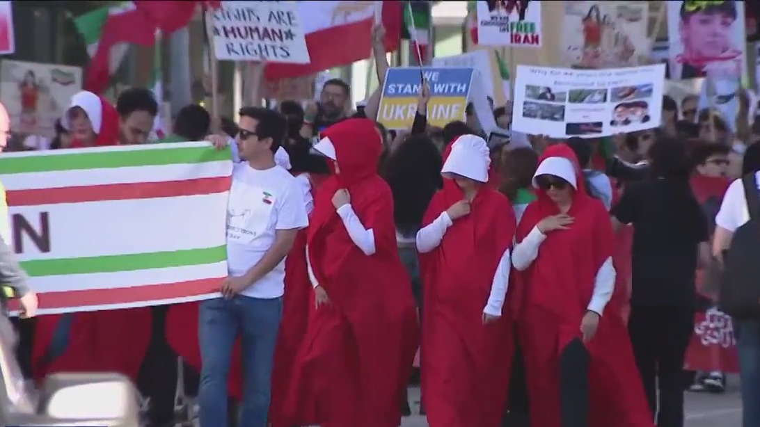 Iranian, Ukrainian communities march in downtown Houston in show of unity