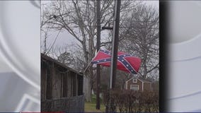 Sante Fe mom arrested for removing confederate flag, son died in school shooting