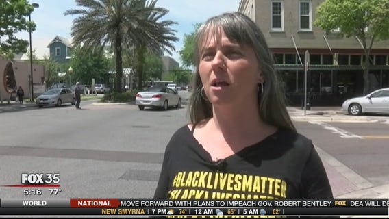 Woman who yelled at Rick Scott explains her actions