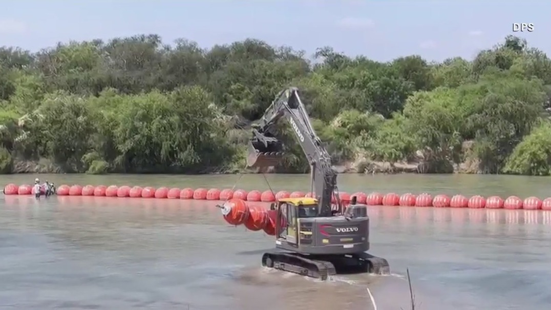 Floating barrier wall in Rio Grande nearing completion