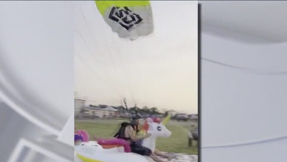 Skydiver lands on inflatable unicorn
