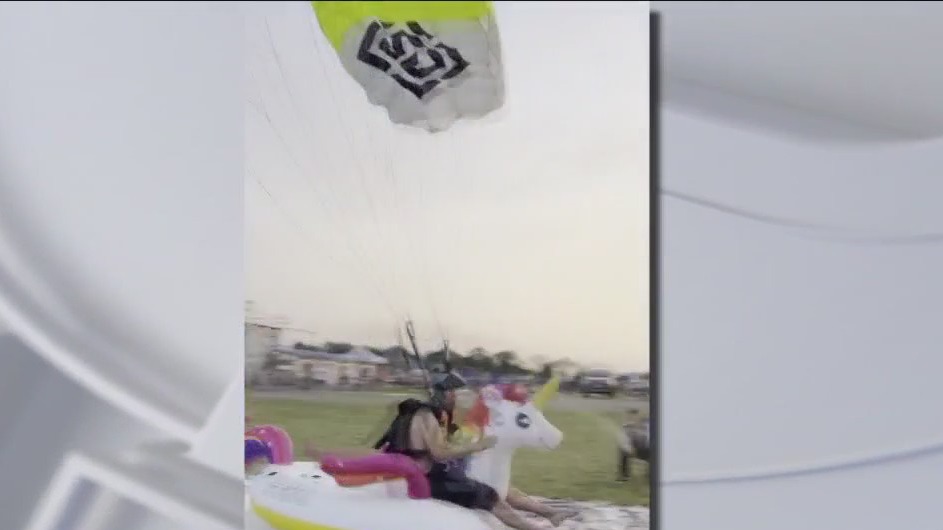 Skydiver lands on inflatable unicorn