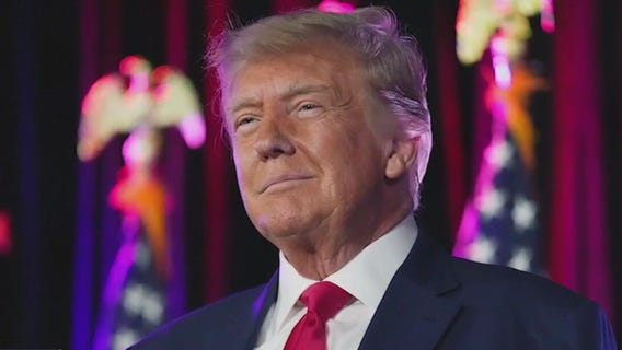 Georgia judge drops some charges against Trump