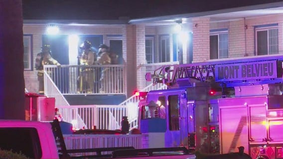 Crews battle Baytown motel fire